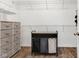 Organized walk-in closet with wooden floors, shelving, and a laundry hamper at 1521 Avondale Dr, Westfield, IN 46074