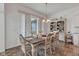 Charming dining area features updated fixtures and lots of natural light at 1521 Avondale Dr, Westfield, IN 46074