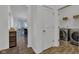 The hallway leads to laundry and living space at 1521 Avondale Dr, Westfield, IN 46074