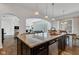 Spacious eat-in kitchen with granite countertops, large island with seating, and open layout at 1521 Avondale Dr, Westfield, IN 46074