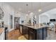 Modern kitchen featuring stainless appliances, granite countertops and island with seating at 1521 Avondale Dr, Westfield, IN 46074