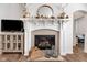 Cozy living room fireplace with a decorative mantle and hearth creating a warm ambiance at 1521 Avondale Dr, Westfield, IN 46074