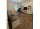 Comfortable living room with hardwood floors, media center, and cozy seating at 1521 Avondale Dr, Westfield, IN 46074