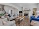 Cozy living room with fireplace and hardwood floors, great for relaxing and entertaining at 1521 Avondale Dr, Westfield, IN 46074