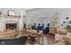 Bright living room with fireplace, plantation shutters, and comfortable seating arrangements at 1521 Avondale Dr, Westfield, IN 46074