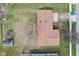 Aerial view of home displaying roof and yard, highlighting its position within the neighborhood at 1620 S East St, Lebanon, IN 46052