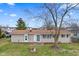 Scenic view of a backyard with lush grass, mature trees, and privacy fencing, creating a peaceful retreat at 1620 S East St, Lebanon, IN 46052