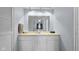 Clean bathroom with white vanity, large mirror, and neutral decor for a calming experience at 1620 S East St, Lebanon, IN 46052