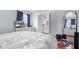 Spacious bedroom featuring hardwood floors, a TV, and an ensuite bathroom access at 1620 S East St, Lebanon, IN 46052