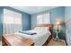 Charming bedroom with a wooden headboard bed and natural light, offering a relaxing and comfortable space at 1620 S East St, Lebanon, IN 46052