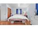 Bright bedroom with hardwood floors, soft lighting, and a comfortable, inviting atmosphere at 1620 S East St, Lebanon, IN 46052