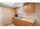 Functional kitchen with wood cabinets, a double sink, and modern appliances for convenience at 1620 S East St, Lebanon, IN 46052