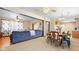 Open-concept living area with a dining space and a view into the adjacent kitchen at 1620 S East St, Lebanon, IN 46052