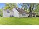 Large backyard with green grass and plenty of shade trees around house at 1641 Whistler Terrace, Indianapolis, IN 46229