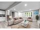 Finished basement featuring a cozy seating area, and light wood floors at 1641 Whistler Terrace, Indianapolis, IN 46229