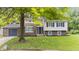 Charming two-story home with a brick front and well-maintained landscaping at 1641 Whistler Terrace, Indianapolis, IN 46229