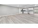 Bright and airy kitchen featuring white cabinets, stainless steel appliances, and light wood floors at 1641 Whistler Terrace, Indianapolis, IN 46229