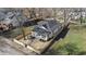 An aerial perspective showing a renovated home and new fence at 1822 N Dexter St, Indianapolis, IN 46202