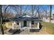 Charming renovated home with a inviting front porch and newly landscaped yard at 1822 N Dexter St, Indianapolis, IN 46202