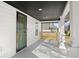 This home has a front porch with painted columns, concrete floors, and a security door at 1822 N Dexter St, Indianapolis, IN 46202