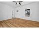 A welcoming interior showcasing stylish floors, neutral walls, and a ceiling fan at 1822 N Dexter St, Indianapolis, IN 46202