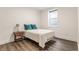 Bedroom with a window that brings in natural light and light color walls at 1955 Alvord St, Indianapolis, IN 46202