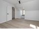 Bright bedroom featuring light gray walls, a window seat, a ceiling fan, and an attached closet at 249 N Hamilton Ave, Indianapolis, IN 46201