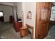 Unique hallway with built-in shelving and access to multiple rooms, offering charm and functionality at 32 E Main St, Mooresville, IN 46158