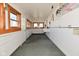 Practical mud room features durable flooring and ample space with lots of natural light at 32 E Main St, Mooresville, IN 46158