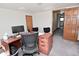 Well-lit office space with wooden desk, office chair, and ample room for work at 32 E Main St, Mooresville, IN 46158