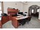 Inviting office area offers built-in desk space, storage, and comfortable seating at 32 E Main St, Mooresville, IN 46158