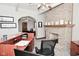 Well-lit office space features a fireplace, archway, and practical desk setups at 32 E Main St, Mooresville, IN 46158