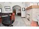 Spacious office layout offers versatile options, with a decorative fireplace and archways at 32 E Main St, Mooresville, IN 46158