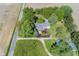 Lovely aerial view of the home nestled among lush greenery and mature trees at 3548 W 500 North Rd, McCordsville, IN 46055