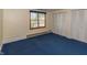 Bedroom with blue carpet, a window, and a closet with white folding doors at 3548 W 500 North Rd, McCordsville, IN 46055