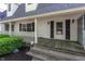 A home with a covered front porch and white railings at 3548 W 500 North Rd, McCordsville, IN 46055