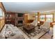 A cozy living room with a brick fireplace and comfortable seating at 3548 W 500 North Rd, McCordsville, IN 46055