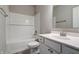Well-lit bathroom with vanity, sink, mirror, toilet, and shower-tub offers essential amenities at 3581 Free Spirit Ct, Westfield, IN 46074