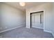 Carpeted bedroom with closet features neutral walls and offers a cozy and organized space at 3581 Free Spirit Ct, Westfield, IN 46074