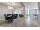 Open concept dining room showcasing modern chandelier and luxury dining set at 3581 Free Spirit Ct, Westfield, IN 46074