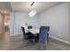 Well-lit dining area featuring a modern chandelier and marble-top table at 3581 Free Spirit Ct, Westfield, IN 46074