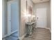 Welcoming hallway featuring stylish console table and decorative artwork at 3581 Free Spirit Ct, Westfield, IN 46074