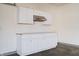 Simple kitchenette featuring white cabinets, tile backsplash and ample countertop space at 3581 Free Spirit Ct, Westfield, IN 46074