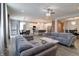 Spacious living area featuring plush sofas and a seamless flow to the kitchen at 3581 Free Spirit Ct, Westfield, IN 46074