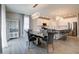 Open floor plan with dining area flowing into modern kitchen featuring island seating at 3581 Free Spirit Ct, Westfield, IN 46074