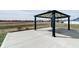Backyard view of the patio with a sleek pergola that makes this outdoor space the perfect gathering spot at 3581 Free Spirit Ct, Westfield, IN 46074