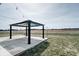 Relaxing pergola area, perfect for enjoying outdoor moments, overlooking the open backyard space at 3581 Free Spirit Ct, Westfield, IN 46074