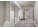 Bright walk-in closet featuring a custom shelving system to maximize storage and organization at 3581 Free Spirit Ct, Westfield, IN 46074