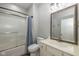 Bathroom featuring a shower with glass doors and a vanity with a large mirror at 3792 Waterfront Way, Plainfield, IN 46168