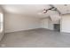 Spacious garage with epoxy flooring and extra storage niche in back at 3792 Waterfront Way, Plainfield, IN 46168